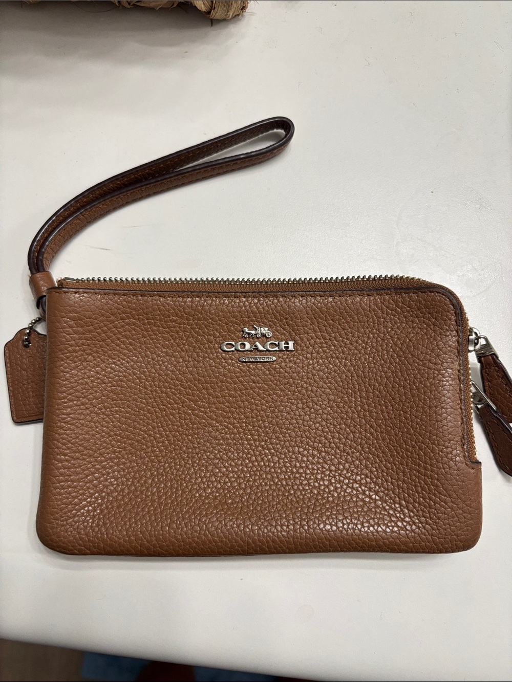 Coach Pebbled Leather Wristlet in Saddle Brown